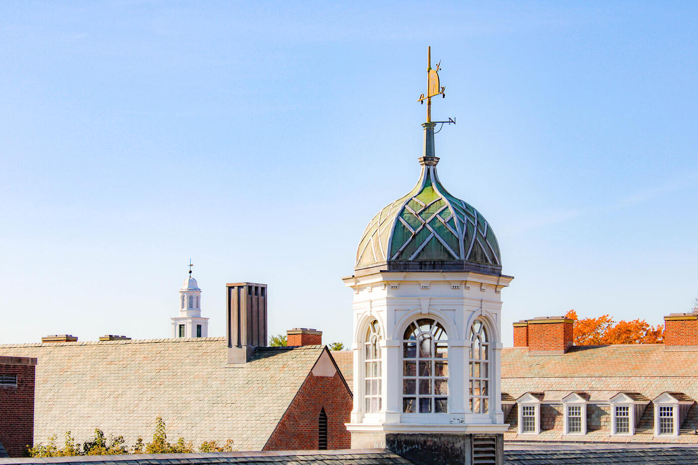 A tower with a weather vane