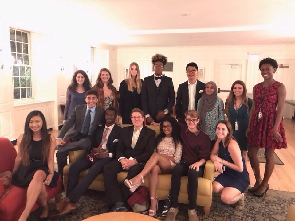 group of people dressed for a formal