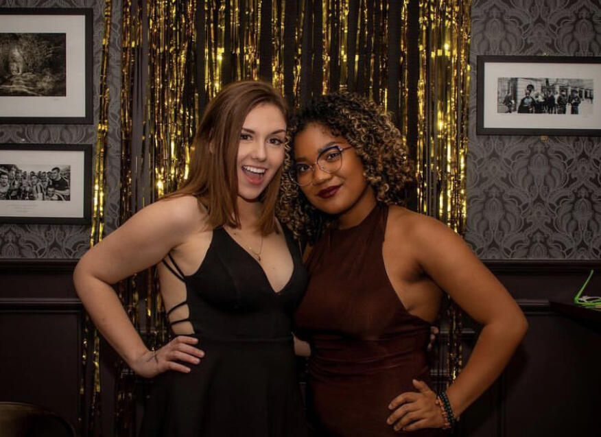 2 friends posing for the photo