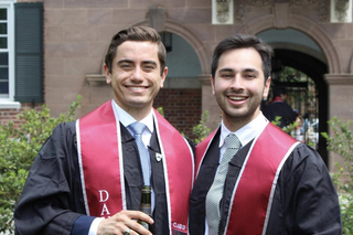 2 people graduating
